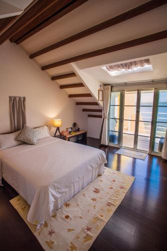 Ένα ή περισσότερα κρεβάτια σε δωμάτιο στο Summer Ya B&B
