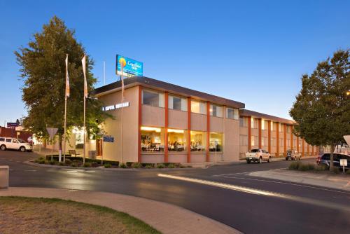 a building on the side of a street at Comfort Inn Capital Horsham in Horsham