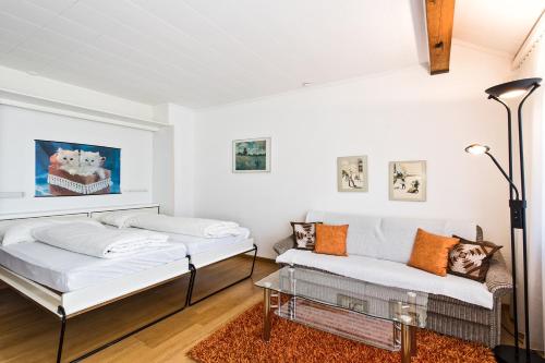 A bed or beds in a room at Appartementhaus-Quadern