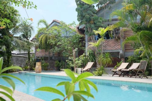 Πισίνα στο ή κοντά στο Panji Panji Tropical Wooden Home