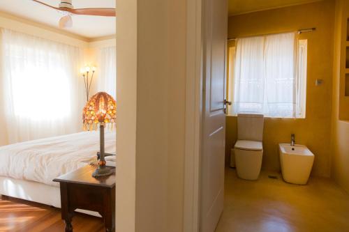 Ένα ή περισσότερα κρεβάτια σε δωμάτιο στο Tenedos Loft Apartment