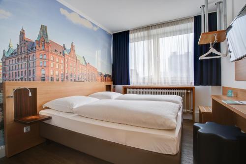 Кровать или кровати в номере Hotel Keese