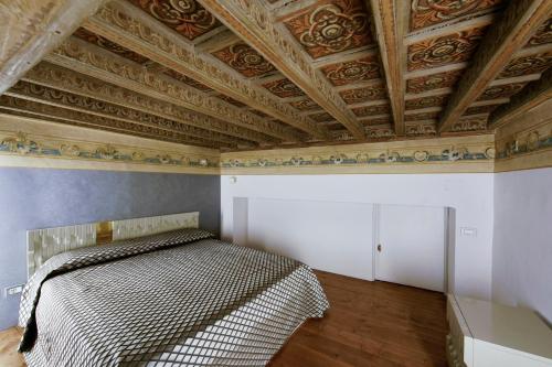 Postel nebo postele na pokoji v ubytování Turin Art Experience Bed & Breakfast
