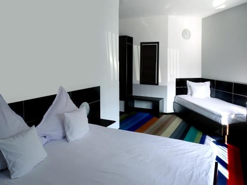 Ένα ή περισσότερα κρεβάτια σε δωμάτιο στο Prince Hotel