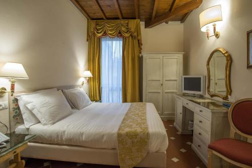 Postel nebo postele na pokoji v ubytování Hotel Atlantic Palace