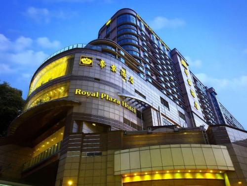 a building with a royal palace hotel sign on it at Royal Plaza Hotel in Hong Kong