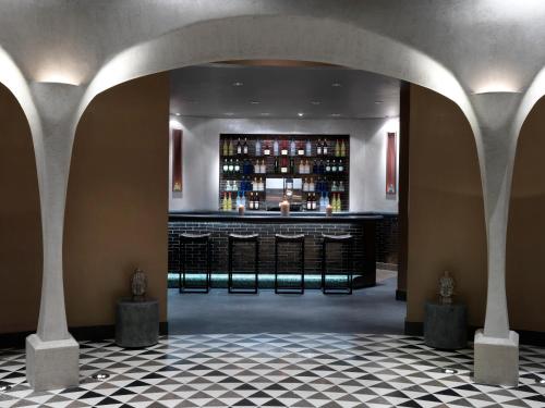 a lobby with a bar with a lot of bottles at Ocean Casino Resort in Atlantic City