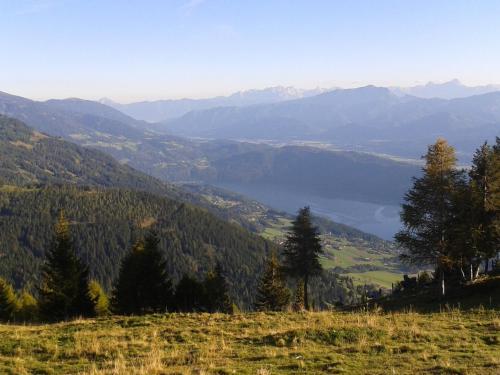 a view of a valley with mountains in the distance at Gästehaus Bärwald in Seeboden