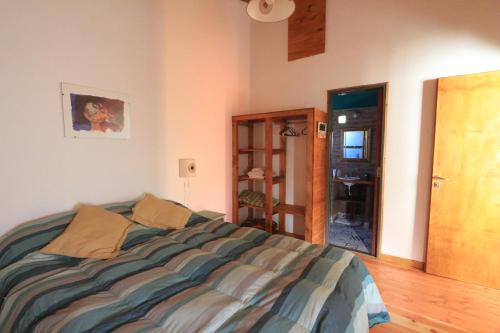 Ένα ή περισσότερα κρεβάτια σε δωμάτιο στο Cabaña Lycas III