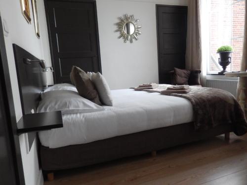 Katil atau katil-katil dalam bilik di B&B De Passant