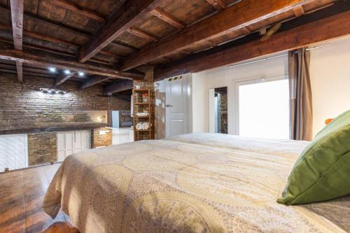 Cama o camas de una habitación en Exclusive Apartment In The Heart Of Seville
