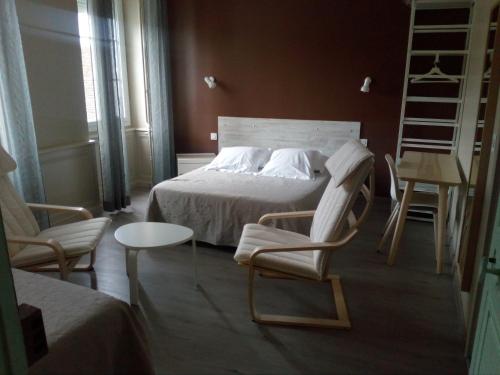 Ліжко або ліжка в номері Chambres d'hôtes d'Accolay