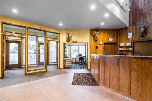a lobby with a bar in a building at Quality Inn Kodiak in Kodiak