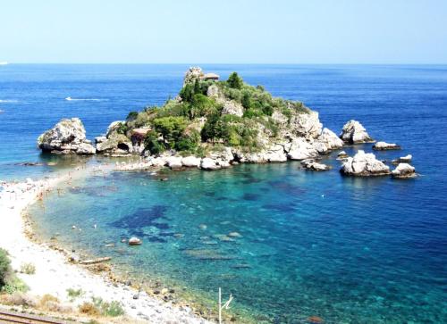 a small island in the middle of the ocean at Casa Vacanza Da Rosa in Letojanni