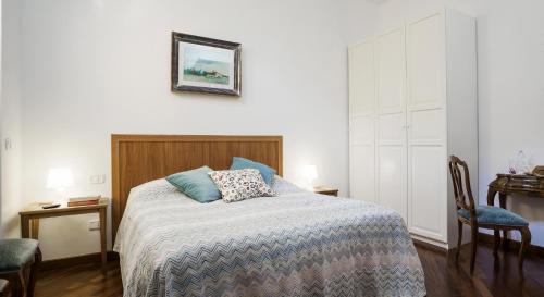Una cama o camas en una habitación de Alloggio La Volta