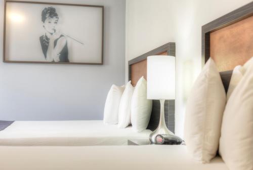 Postel nebo postele na pokoji v ubytování Hotel Ruby