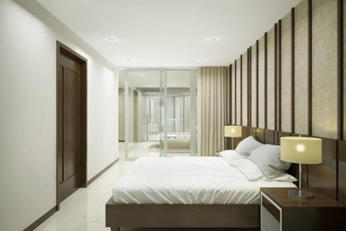 Giường trong phòng chung tại Luxury Ocean View Apartment