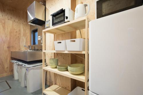 Кухня или мини-кухня в Vacation"Ninja"house Secretbase near Asakusa
