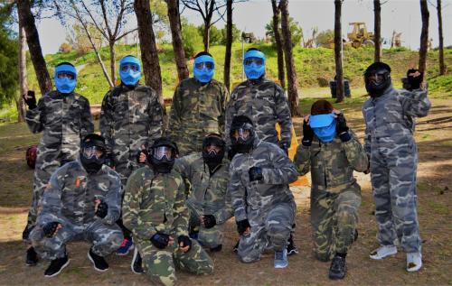 a group of soldiers wearing masks posing for a picture at Mnar Park aqua park in Tangier