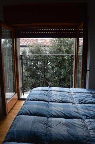 Voodi või voodid majutusasutuse Appartamenti "Venice" toas