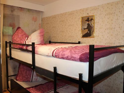 a bedroom with two bunk beds in a room at Charming Apartment in Kr pelin with Barbecue in Kröpelin