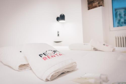 a towel with a hello kitty on it sitting on a bathroom counter at Moyua Apartment by People Rentals in Bilbao