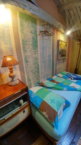 Ένα ή περισσότερα κρεβάτια σε δωμάτιο στο Rooster Hostel