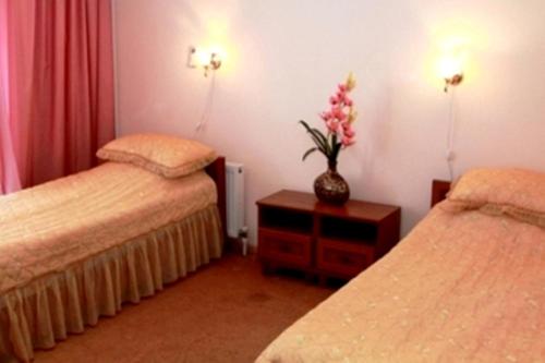 Postel nebo postele na pokoji v ubytování Edem Hotel