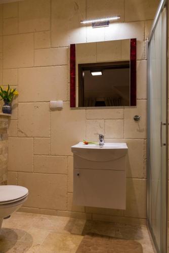 Ein Badezimmer in der Unterkunft Gościniec Krutyński