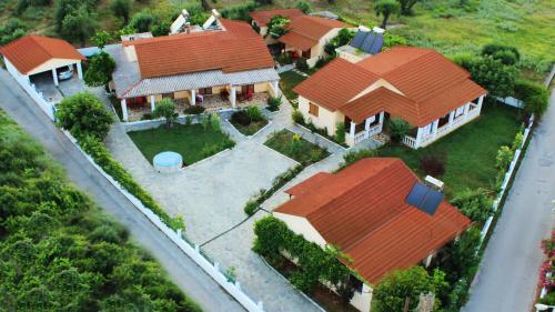 an overhead view of a house with orange roofs at Villa Panorea in Moraitika