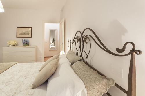 Ein Bett oder Betten in einem Zimmer der Unterkunft Canto XI