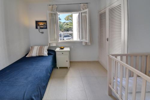 Postel nebo postele na pokoji v ubytování Apartamento Ferrera Park 206