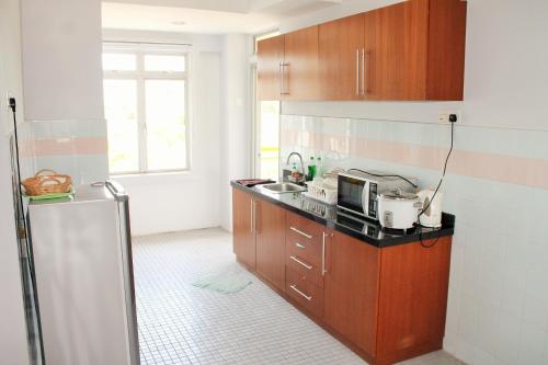 Kuchyň nebo kuchyňský kout v ubytování Ocean View Resort