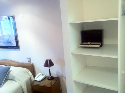TV a/nebo společenská místnost v ubytování Hotel Montecarlo Viña del Mar