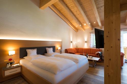 Postel nebo postele na pokoji v ubytování Hotel Bellevue