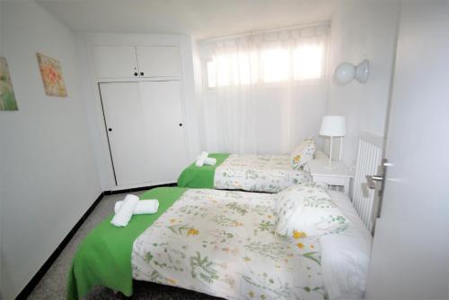 Postel nebo postele na pokoji v ubytování MyFlats Azul