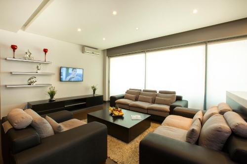 Ruang duduk di Orient Queen Homes Hotel