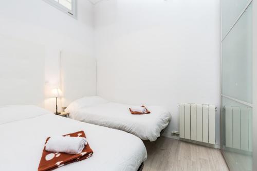 Posteľ alebo postele v izbe v ubytovaní Montaber Apartment - Trafalgar