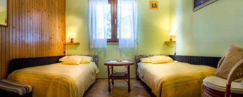 Ένα ή περισσότερα κρεβάτια σε δωμάτιο στο Apartmani Marica
