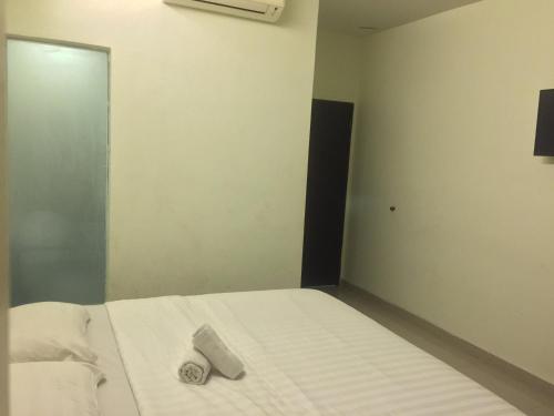 Ένα ή περισσότερα κρεβάτια σε δωμάτιο στο Desa house hotel