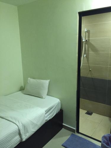 Ένα ή περισσότερα κρεβάτια σε δωμάτιο στο Desa house hotel