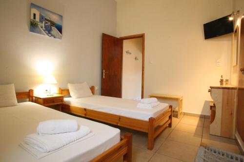 Katil atau katil-katil dalam bilik di Oasis Rooms & Studios in Galissas