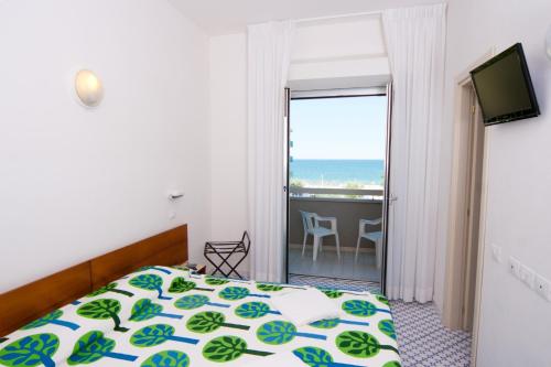 Кровать или кровати в номере Hotel Le Terrazze