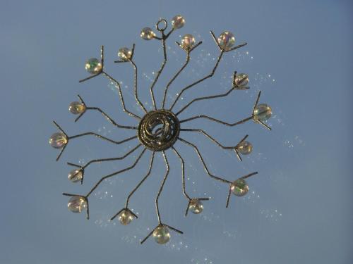 a chandelier in the shape of a sun at Badische Landoase in Kehl am Rhein