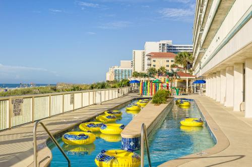 a row of yellow boats in the water on a building at Westgate Myrtle Beach Oceanfront Resort in Myrtle Beach