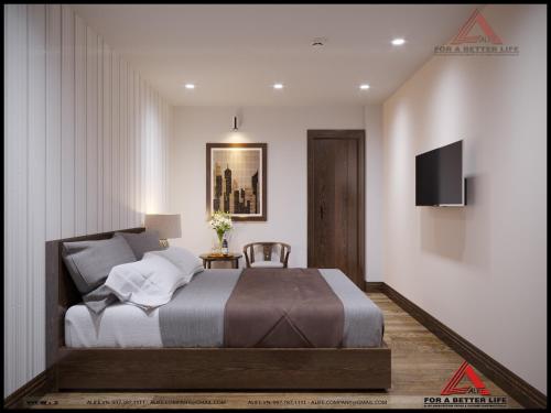 Un ou plusieurs lits dans un hébergement de l'établissement Van Giang Hotel