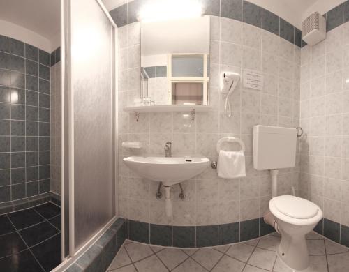 Koupelna v ubytování Hotel Sali