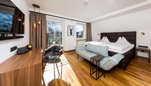 Postel nebo postele na pokoji v ubytování Boutique-Hotel Bayerischer Hof