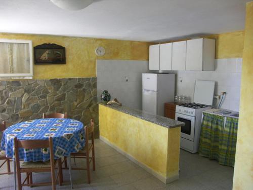 Kuhinja oz. manjša kuhinja v nastanitvi Locanda del Pescatore