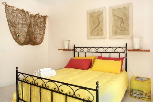 Posteľ alebo postele v izbe v ubytovaní Adriana casa vacanze mare Etna Sicilia